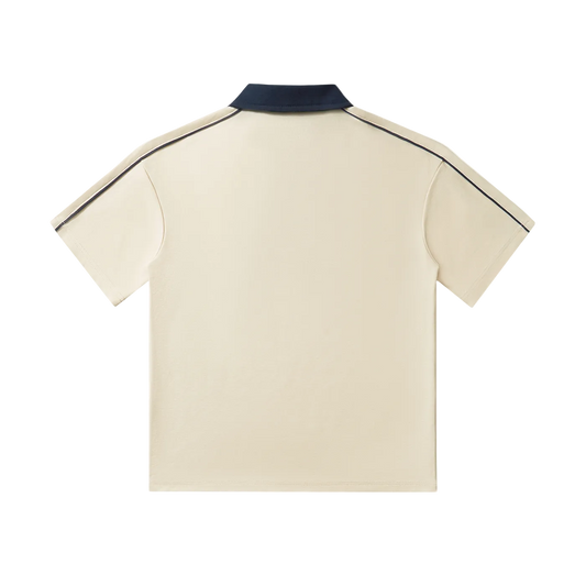 Beige polo shirt with navy collar and shoulder stripes, back view