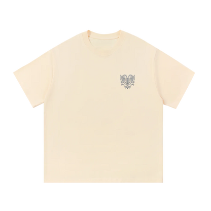 Cream T-shirt with embroidered eagle logo, minimalist streetwear design