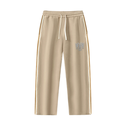 Beige drawstring joggers with side stripes and eagle emblem, relaxed fit athletic pants