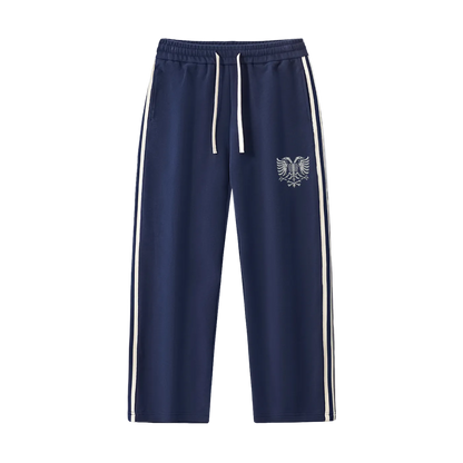 Navy blue joggers with white side stripes and eagle emblem, elastic waist with drawstring
