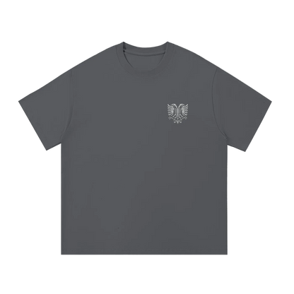 Dark gray t-shirt with small white eagle skeleton graphic on chest, minimalist streetwear design