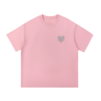 Pink oversized T-shirt with embroidered eagle graphic on chest