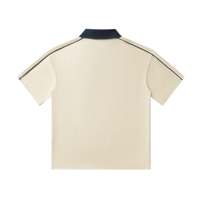 Beige polo shirt with navy collar and shoulder stripes, back view