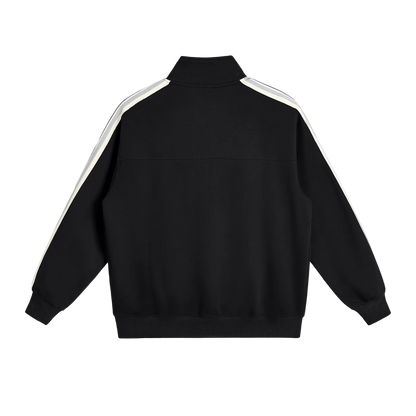 Black track jacket with white shoulder stripes, back view