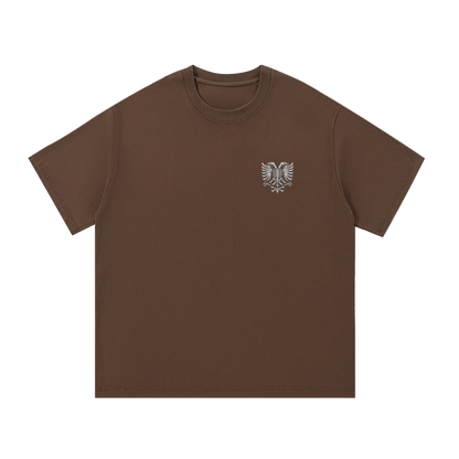 Brown t-shirt with eagle skeleton graphic, streetwear style, bold chest print